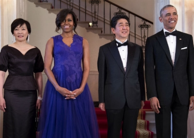Japan's Prime Minister Shinzo Abe and his wife Akie Abe  pose with US President Barack Obama and US First Lady Michelle Obama before a state dinner at the White House April 28, 2015 in Washington, DC. (BRENDAN SMIALOWSKI/AFP/Getty Images)