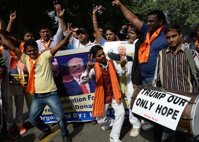 Right-wing activists of India's Hindu Sena celebrate Donald Trump's victory in the U.S. presidential elections in New Delhi on November 9, 2016. (Prakash Singh/AFP/Getty Images)