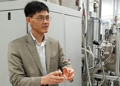 Xiaoxing Xi stands in his lab. (Xiaoxing Xi)