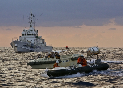 A Japanese flotilla from Japan's coast guard is vigilant in defending the waters off the Senkaku/Diaoyu islands. (Al Jazeera English/Flickr)
