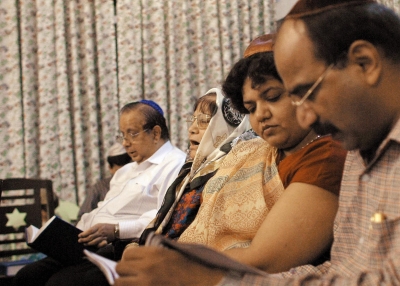 Indian Jews singing hymns at the Judah Hyam Hall Synagogue in New Delhi on September 4, 2003. (Findlay Kember/AFP/Getty Images)