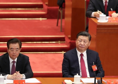 Hu Jintao (L), Xi Jinping (C), and Jiang Zemin (R)
