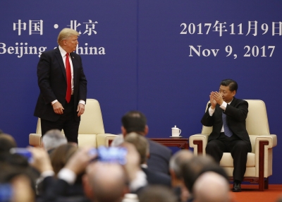 U.S. President Donald Trump and China's President Xi Jinping meet business leaders at the Great Hall of the People on November 9, 2017 in Beijing, China.