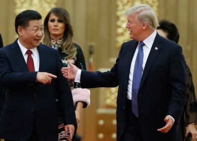 Xi Jinping talks with Donald Trump in China
