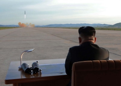 North Korean leader Kim Jong-Un inspecting a launching drill of the medium-and-long range strategic ballistic rocket Hwasong-12