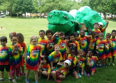 Kindergarten and first grade students celebrate the last day of school at field day