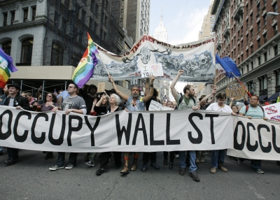 Occupy Wall Street protestors march through New York City in May 2012.