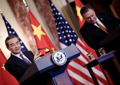 Mike Pompeo listens as Wang Yi talks on May 23, 2018, in Washington, D.C.