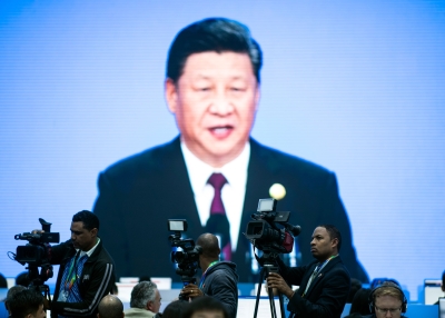 Xi Jinping on television in Shanghai.