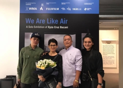 Xyza Cruz Bacani and family at book launch event 