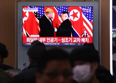 Donald Trump and Kim Jong Un greet each other in Hanoi, Vietnam