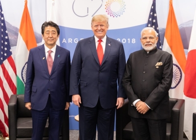 Prime Minister Abe, President Trump, and Prime Minister Modi pose for a photo after a meeting at the G20 meetings in Argentina