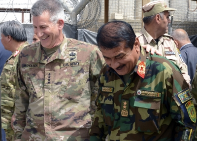 Army Gen. John W. Nicholson, commander of NATO’s Resolute Support mission and of U.S. Forces in Afghanistan, shares a laugh with Afghan National Army Gen. Imam Nazar, 205th Corps commander, during a visit to the Train, Advise and Assist Command South region, May 14, 2018. 