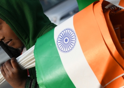 Indian vendor selling flags for Republic Day.