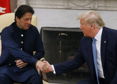 Pakistani Prime Minister shakes U.S. President Donald Trump's hand.