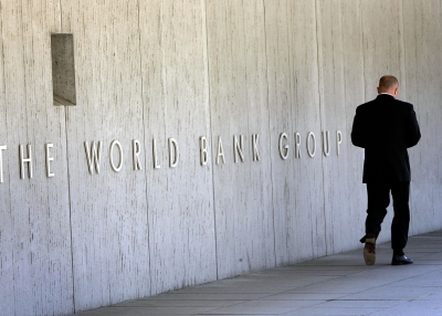 A person walks outside World Bank headquarters in Washington