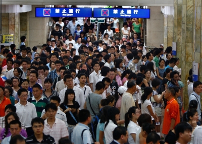 A crowd fills a crowded station in Beijing