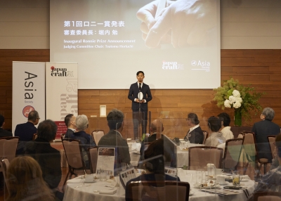 Mr. Takuya Tsutsumi making a speech after winning the Ronnie Prize