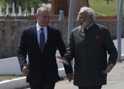 Russian President Vladimir Putin (L) and Indian Prime Minister Narendra Modi (R) seen while walking at the Russky Island in Vladivostok, Russia, September 4, 2019. 
