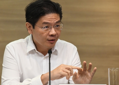 Singapores National Development Minister Lawrence Wong speaks during a press conference on coronavirus situation in Singapore on January 27, 2020.