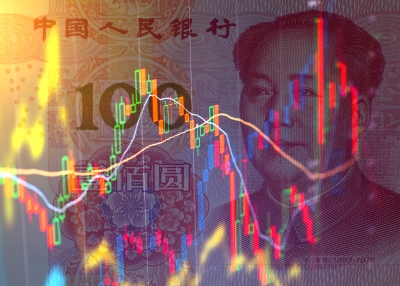 100 yuan banknote on the background of stock charts.