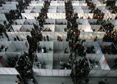 Job seekers visit a job fair for graduating university students at the Qujiang International Convention and Exhibition Center on February 28, 2009 in Xian of Shaanxi Province, China.
