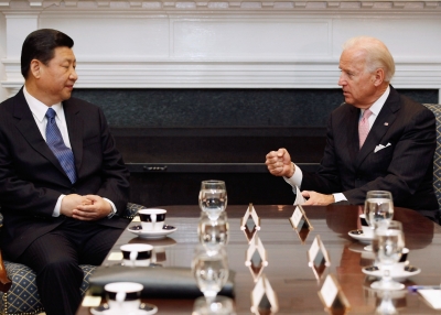 U.S. Vice President Joe Biden (R) and Chinese Vice President Xi Jinping talk during an expanded bilateral meeting with other U.S. and Chinese officials in the Roosevelt Room at the White House February 14, 2012 in Washington, DC. 