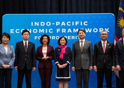 Secretary of Commerce Gina Raimondo and US Trade Representative Katherine Tai, center, and economic leaders pose for a group photo during the Indo-Pacific Economic Framework and Prosperity ministerial during the Asia-Pacific Economic Cooperation (APEC) summit at Mariott Marquis on November, 14, 2023 in San Francisco, California. The 2023 APEC Summit is set to run through November 17, with more than 30,000 people including dozens of world leaders and hundreds of CEOs attending the event. 