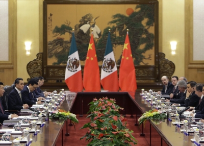 Mexico's President Enrique Pena Nieto (2nd R) and China's President Xi Jinping (L) talk during their meeting at the Great Hall of the People on November 13, 2014 in Beijing, China