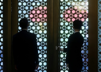Staff wait for the arrival of U.S. Secretary of State Antony Blinken ahead of his meeting with China's Foreign Minister Qin Gang at the Diaoyutai State Guesthouse in Beijing on June 18, 2023.