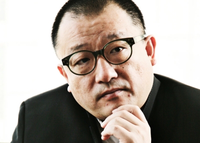 A flattering headshot of filmmaker Wang Xioashuai