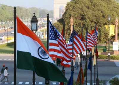 US and Indian flags fly on Rajpath in front of India Gate in New Delhi.