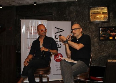 "Narcopolis" author Jeet Thayil (L)  and filmmaker Dev Benegal (R) in Mumbai on August 1, 2013. (Asia Society India Centre)