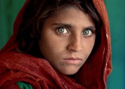 Steve McCurry, Sharbat Gula, “Afghan Girl,” at Nasir Bagh refugee camp near Peshawar, Pakistan, 1984, © Steve McCurry