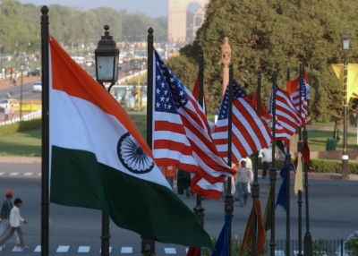 U.S. and Indian flags fly on Rajpath in front of India Gate in New Delhi, India. (Manpreet Romana/AFP/Getty Images)