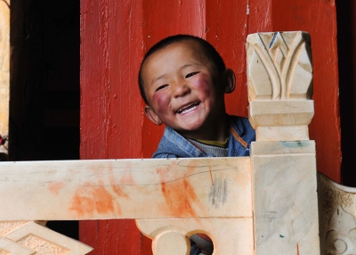 A boy smiles in China. (Padmanaba01 / Flickr)