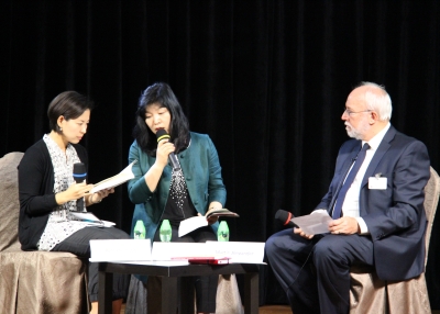 Novelist Shin Kyung-sook (C) spoke through her translator (L) with Martin Alexander (R) at Asia Society Hong Kong Center on May 8, 2012. (Asia Society Hong Kong Center) 