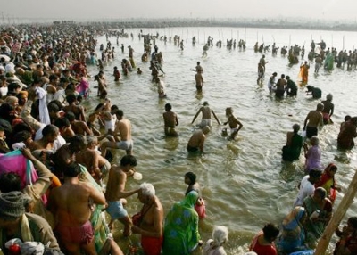 Hindu pilgrims bathe at the ritual bathing site at Sangam during the Ardh Kumbh Mela festival in Allahabad, India. (Mario Tama/Getty Images)