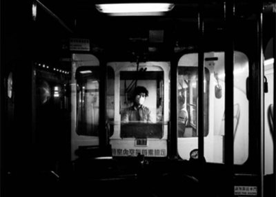 A tram driver at midnight. Xyza Bacani 2016.