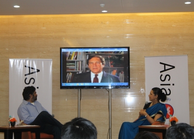 L to R: Hartosh Singh Bal, Ambassador Karl F. Inderfurth (onscreen) and Ambassador Meera Shankar. (Asia Society India Centre)