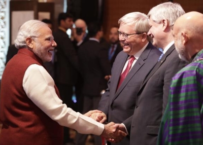 PM Narendra Modi with former PM of Australia Kevin Rudd, former PM of Canada Stephen Harper and former Afghanistan president Hamid Karzai in New Delhi on Tuesday. (PTI)