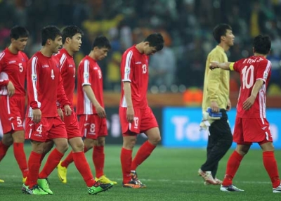 The North Korea team after defeat and elimination from the tournament during the 2010 FIFA World Cup South Africa Group G match between North Korea and Ivory Coast on June 25, 2010. (Michael Steele/Getty Images)