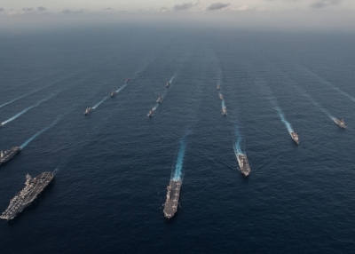 The Ronald Reagan Carrier Strike Group (CSG) is underway in formation with Japan Maritime Self-Defense Force ships for a photo exercise during Annual Exercise 16. The Ronald Reagan CSG is participating in Annual Exercise 16 to increase interoperability between Japanese and American forces through training in air and sea operations (U.S. Navy/Mass Communication Specialist 3rd Class Nathan Burke/Flickr).