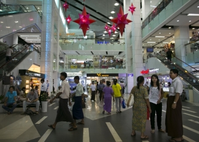 Shoppers browse inside the Junction Square shopping mall on November 30, 2012 in downtown Yangon, Myanmar. (Paula Bronstein/Getty Images)