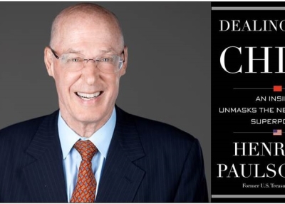 Former U.S. Treasury Secretary Henry Paulson Jr. and his new book "Dealing with China: An Insider Unmasks the New Economic Superpower" (2015). 