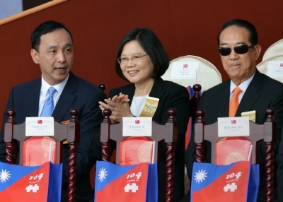 (L to R) Eric Chu, chairman of Taiwan's ruling Kuomintang (KMT), Tsai Ing-wen, chairwoman of Taiwan's main opposition Democratic Progressive Party (DPP), and James Soong, chairman of the opposition People First Party (PFP) attend a National Day ceremony in front of the presidential palace in Taipei on October 10, 2015. (SAM YEH/AFP/Getty Images)