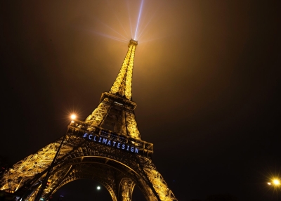 A picture taken on December 5, 2015 shows the Eiffel Tower enlightened with a bl