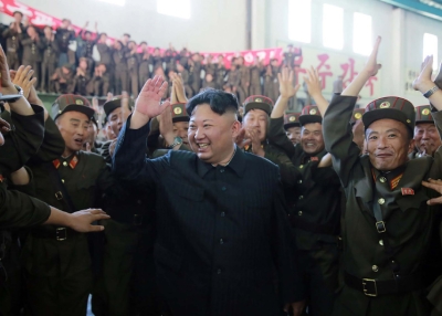 This picture taken on July 4, 2017 and released from North Korea's official Korean Central News Agency on July 5, 2017 shows North Korean leader Kim Jong-Un celebrating the successful test-fire of the intercontinental ballistic missile Hwasong-14 at an undisclosed location. (STR/AFP/Getty Images)