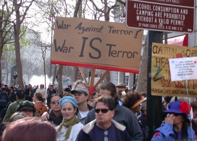 War against Terror: A sign held up by some commie protestors in San Francisco. (Chance Gardener/Flickr)