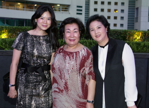 Hyun-Sook Lee (C), founder of Kukje Gallery in Seoul, flanked by guests. (Eric Powell/Asia Society)